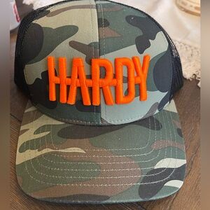 NWOT HARDY Camouflage Trucker Hat Embroidered Logo One Size Green Black